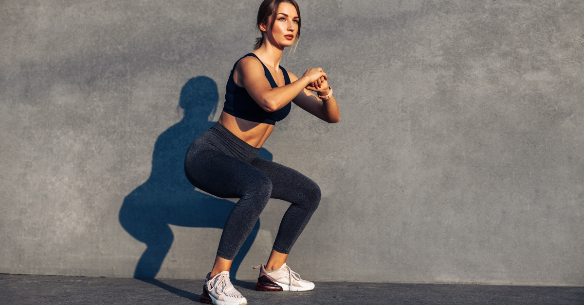 image of a sportive woman doing squats